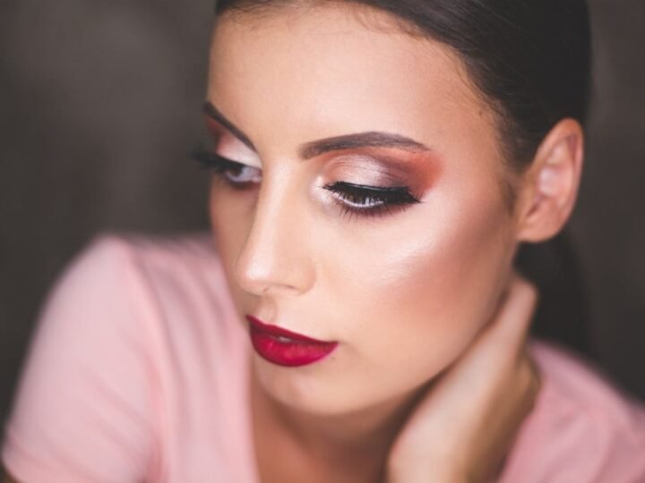 Close-up portrait with luminous skin and softly controlled shine across the face