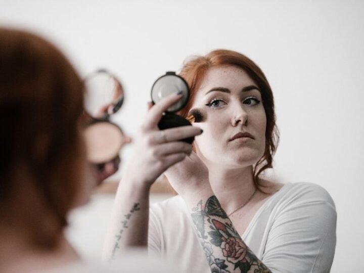 Soft blush placed high on the cheeks for lifted color without heavy contour