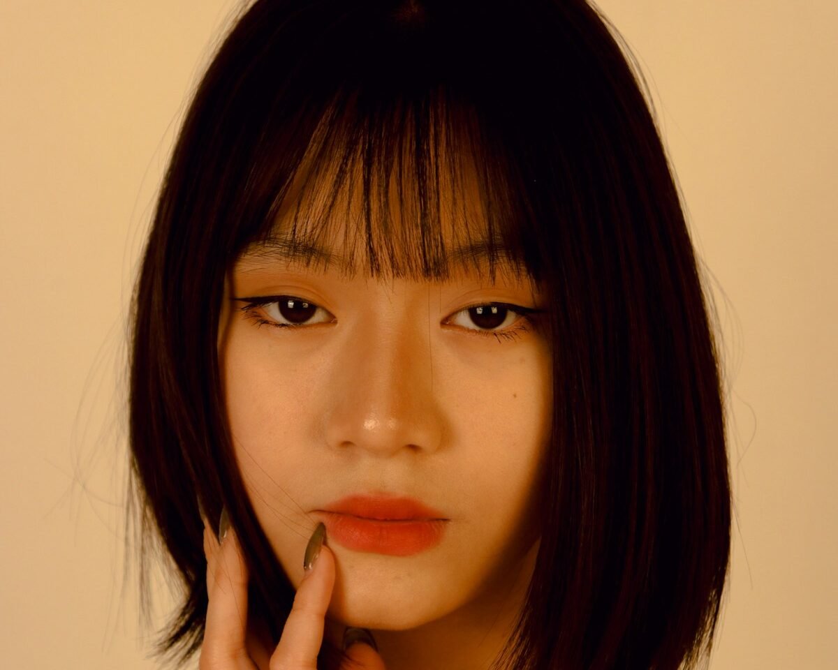 Woman with a short bob haircut showing a clean compact perimeter