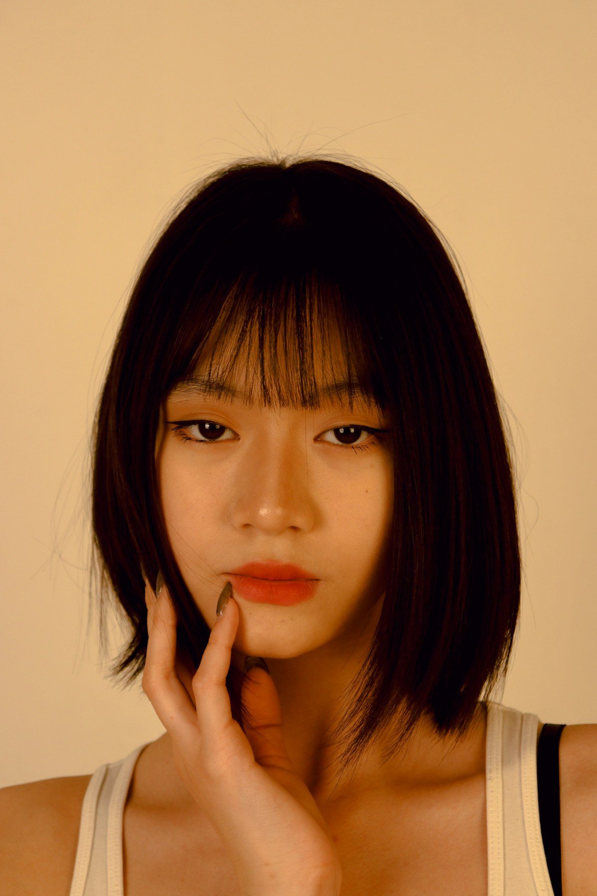 Woman with a short bob haircut showing a clean compact perimeter