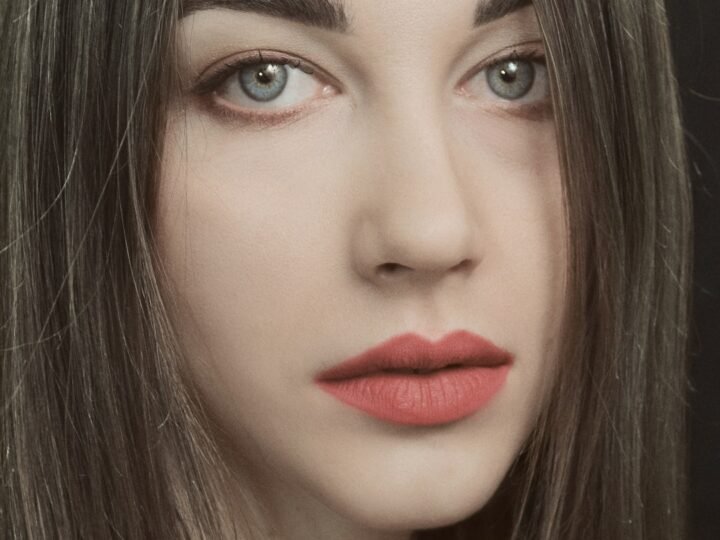 Close beauty portrait with eye and lip makeup visible