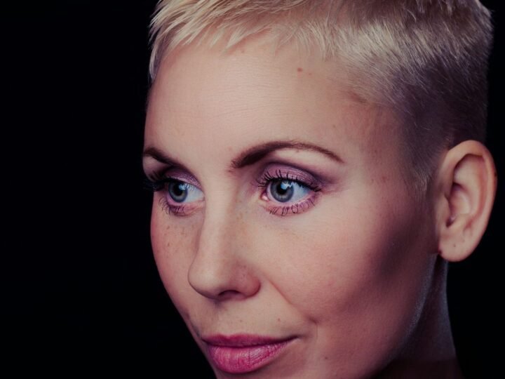 Short blonde crop with a soft textured top and close-cut sides