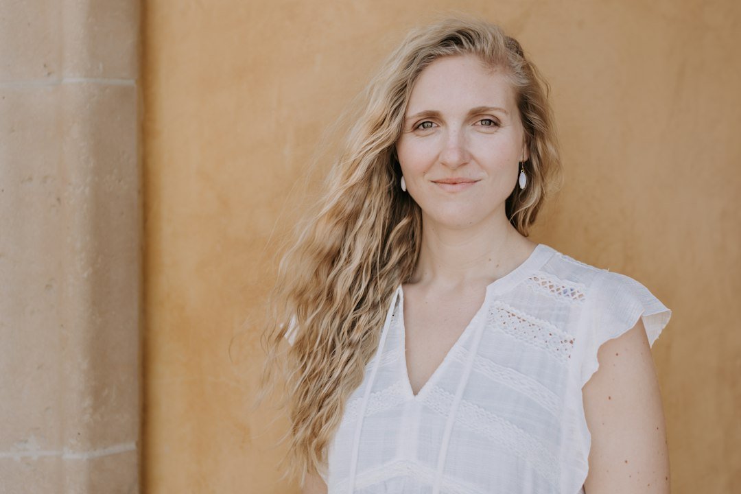 Woman with loose natural waves and softly textured hair