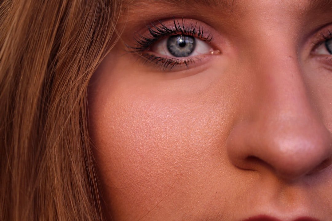 Woman with natural-looking polished makeup and softly defined features
