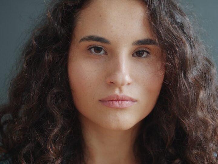 Portrait with textured curly hair and visible face-framing shape