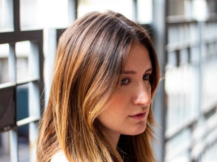 Woman with long hair showing natural-looking color variation