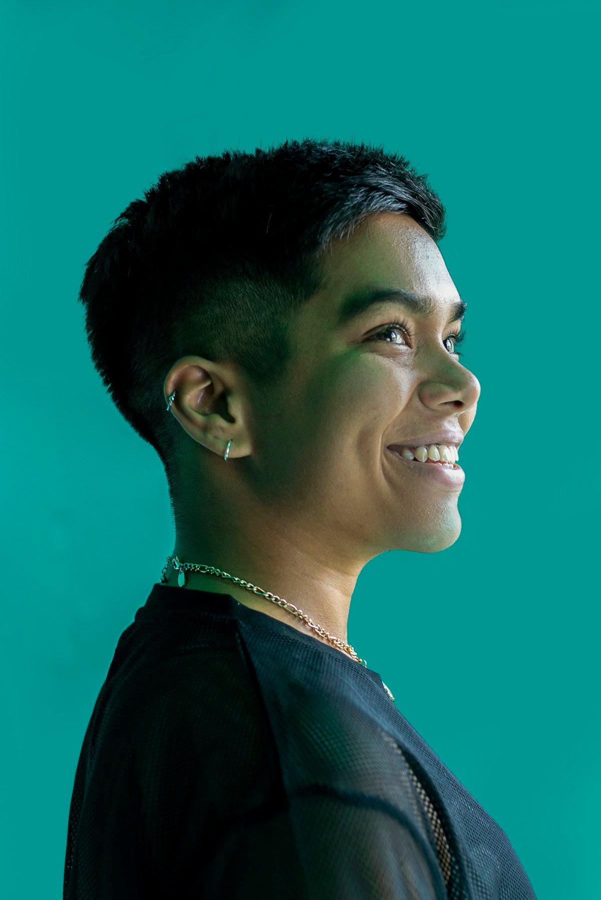 Woman with a short haircut showing soft texture and a compact shape