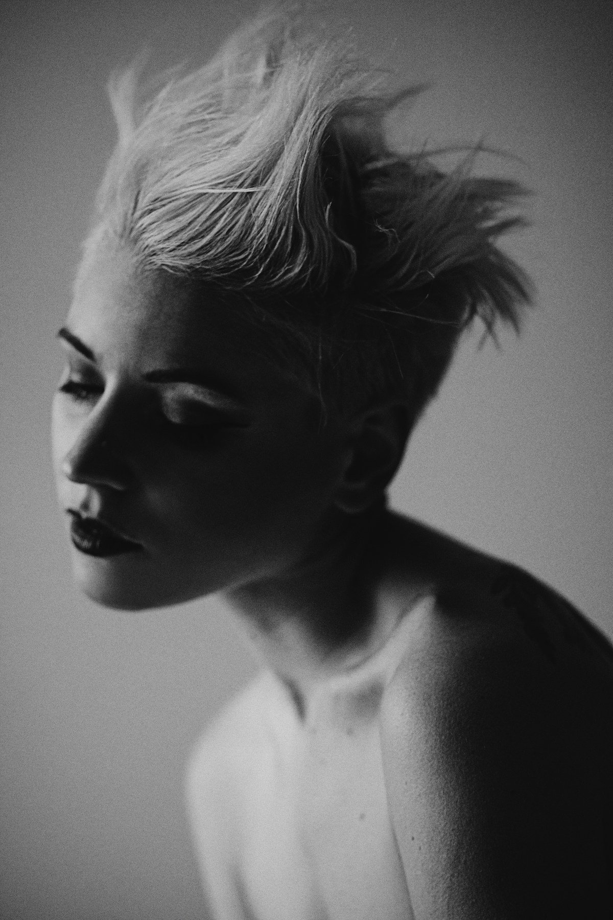 Woman with short spiked hair showing a more separated choppy texture through the crown
