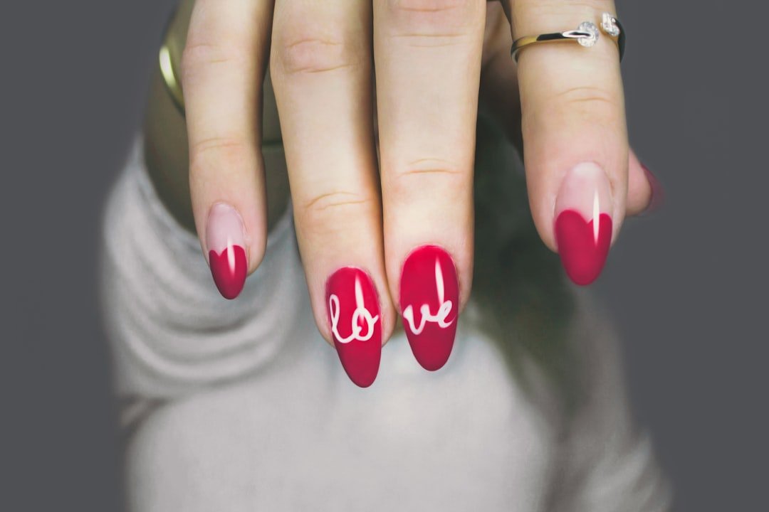 Deep plum-burgundy manicure used as a color-depth reference for sheer plum nails