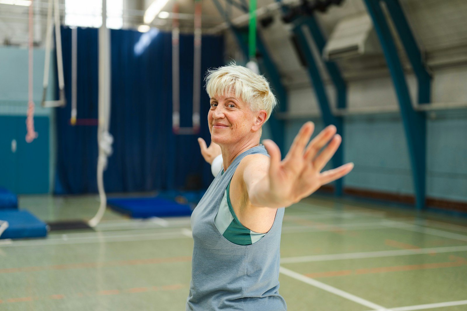 Older woman with short hair showing a practical cropped shape in natural light