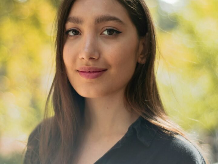 Woman with natural-looking skin and minimal polished makeup