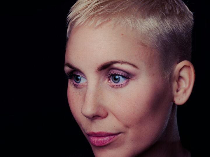 Short blonde crop with soft textured top and close-cut sides
