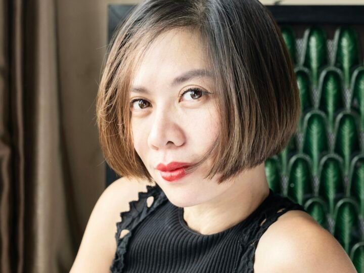 Woman with a polished short bob haircut