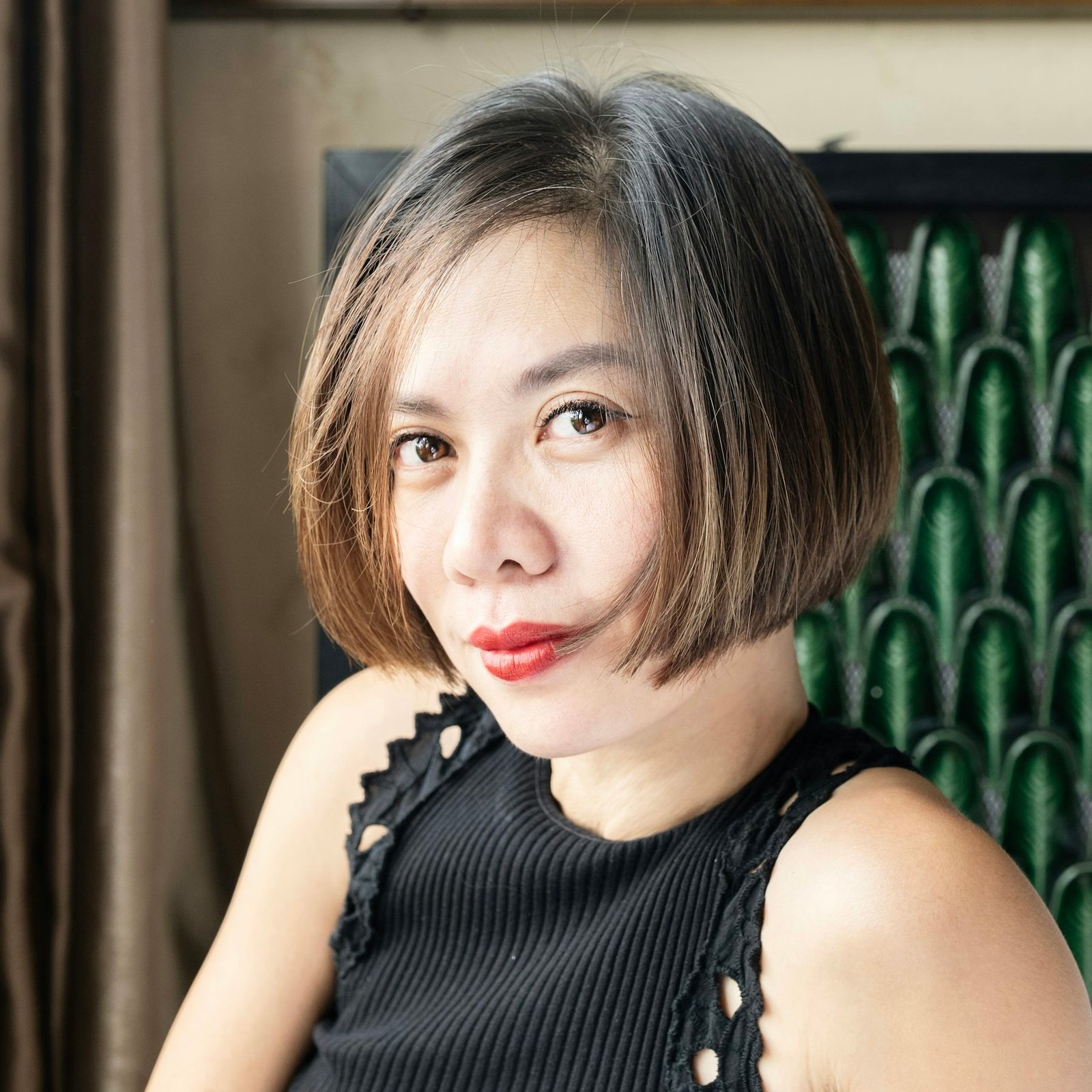 Woman with a polished short bob haircut