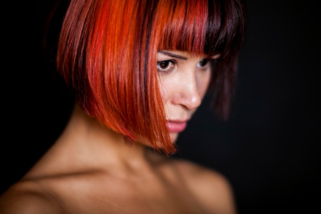 Portrait with rich red hair showing warm tonal depth